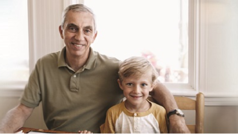 Man sitting with child